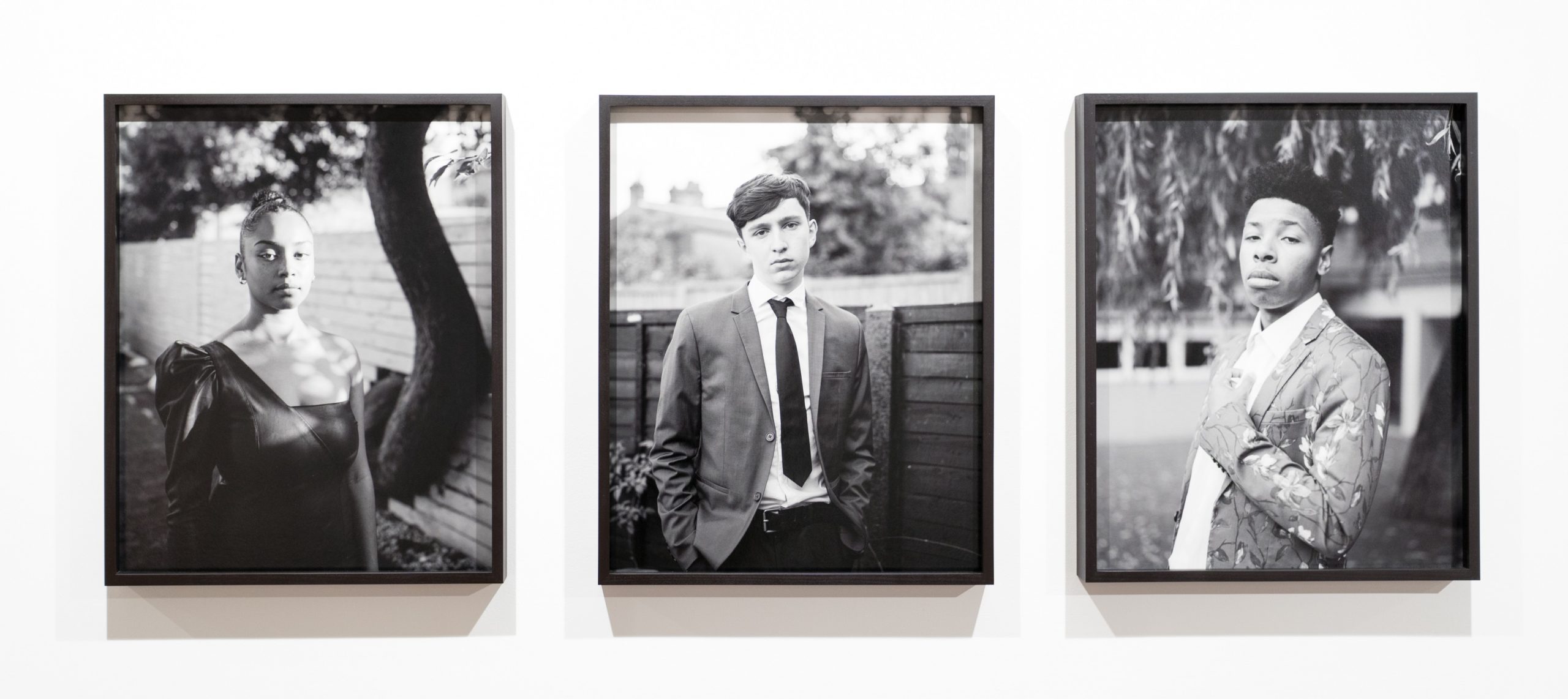 Black and white portraits of young people. Part of the Youth Rising in the UK 1981-2021 exhibition.