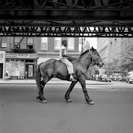 Vivian_Mayer horse riding on city street